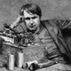 Thomas Edison listening to a primitive version of headphones circa 1871. (Image: Getty)